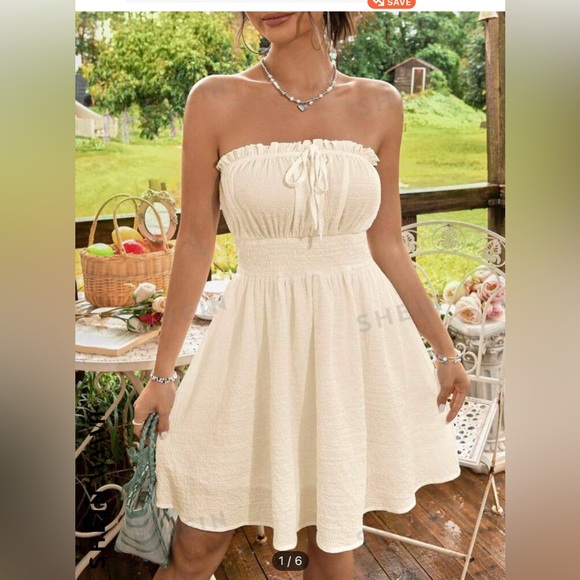 Never worn. Brand new Woman dress. Size L. Never worn. Fully lined. - Picture 1 of 4